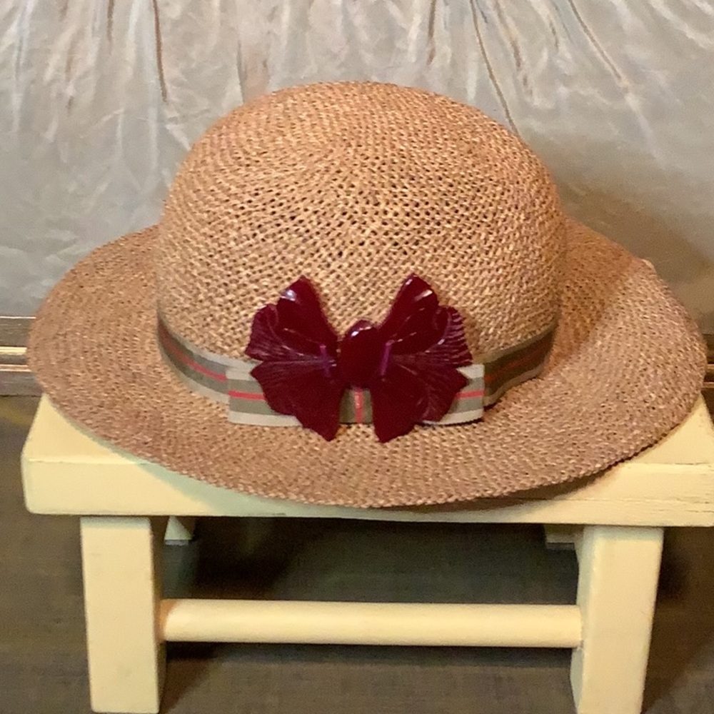 Vintage straw hat with Bakelite box adornment.